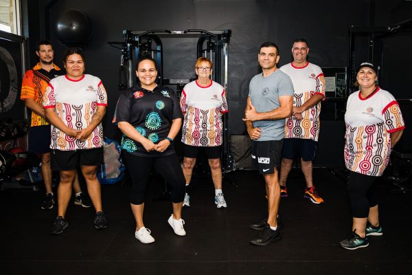 A group of Aboriginal people ready to exercise