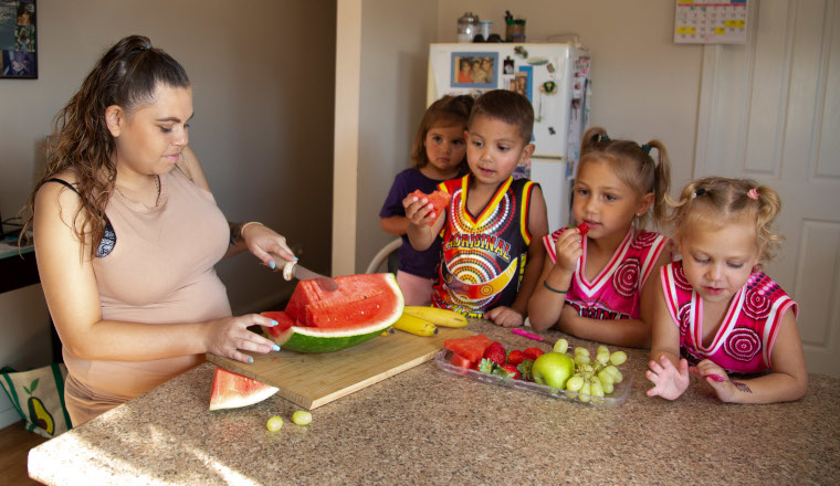 Family eating fruit