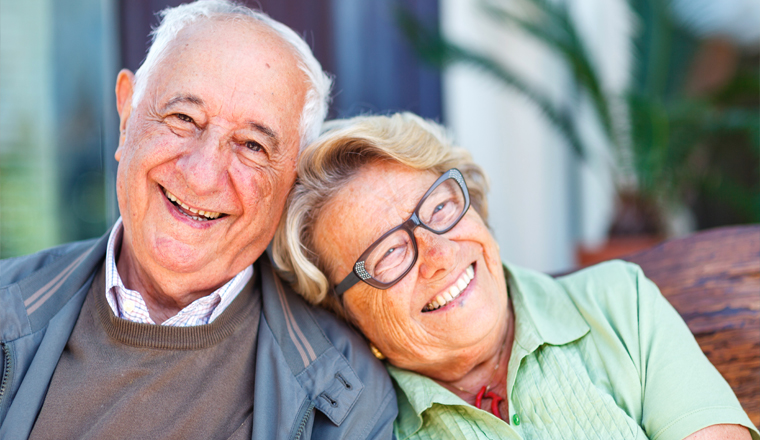 Elderly couple smiling 