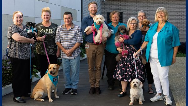 8 adults with their dogs