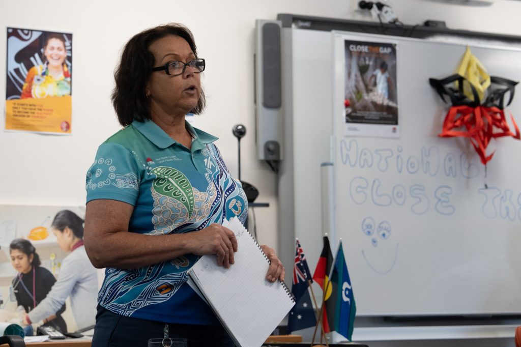An Aboriginal health worker giving a speech