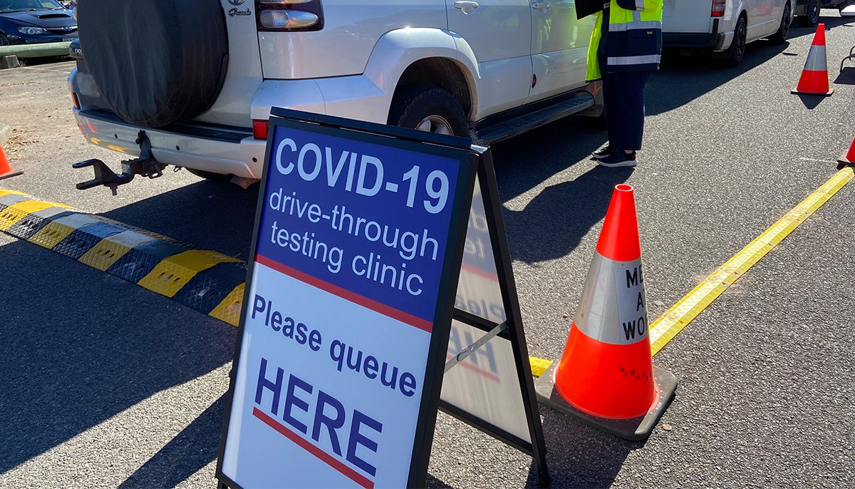 Sign advertising drive-through COVID-19 testing