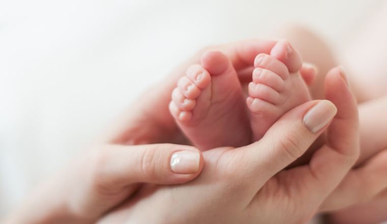 Tiny newborn feet