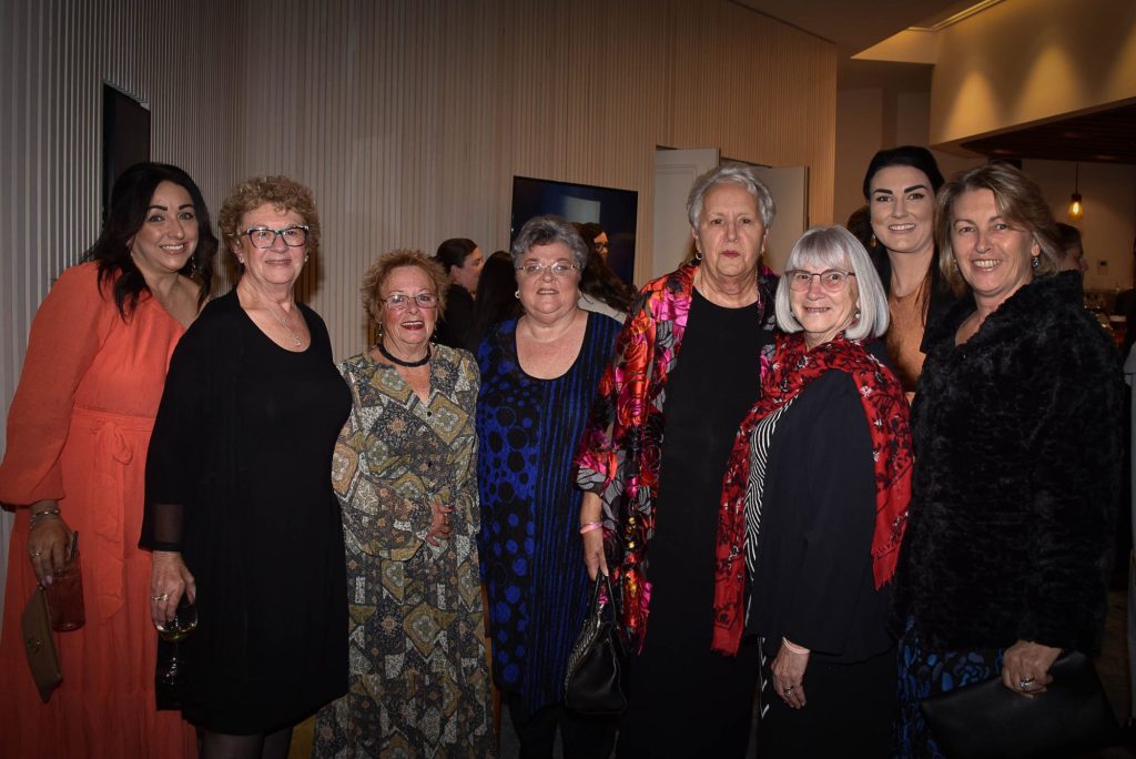 group of women dressed for a gala awards night