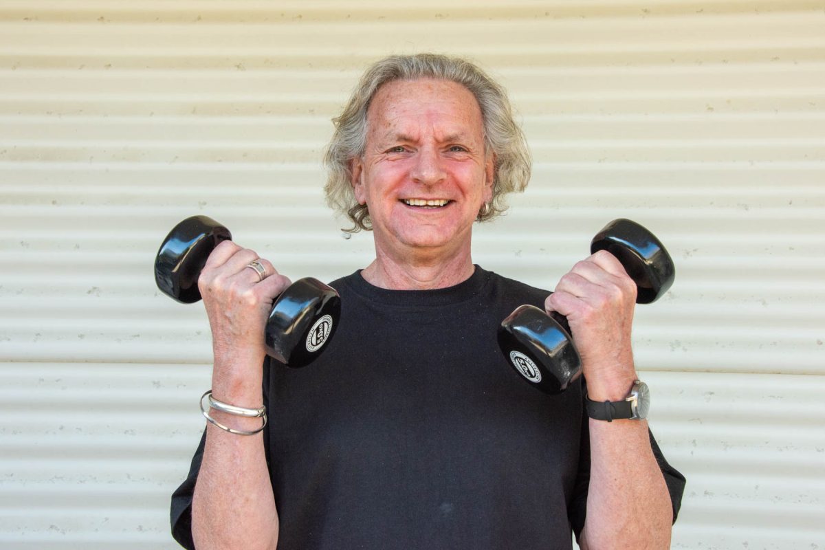 Man lifting weights.